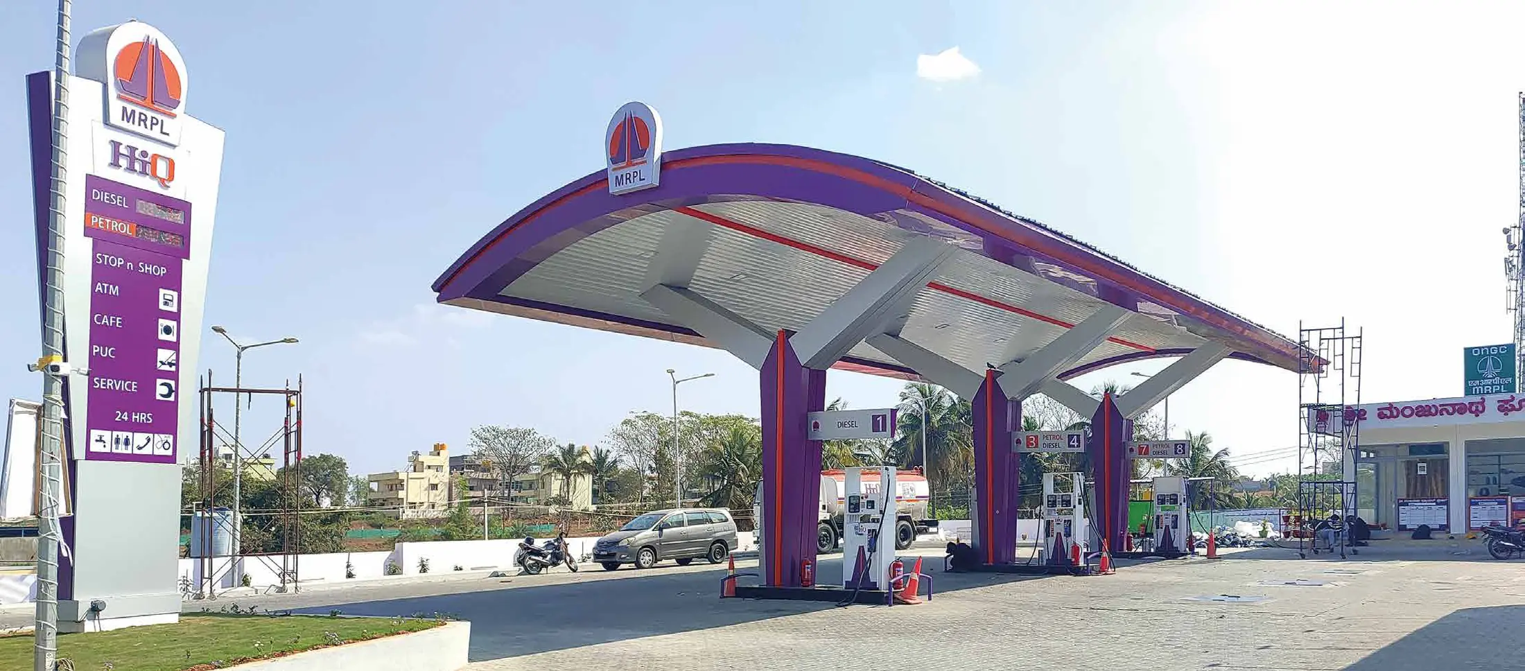 MRPL HiQ fuel station with purple canopy fascia and pylon sign
