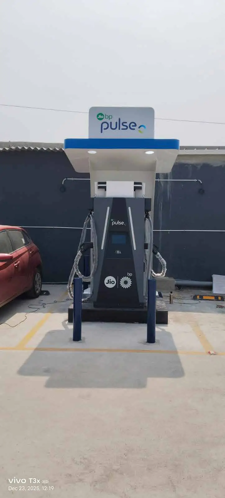 Jio-bp Pulse EV charger with branded header panel